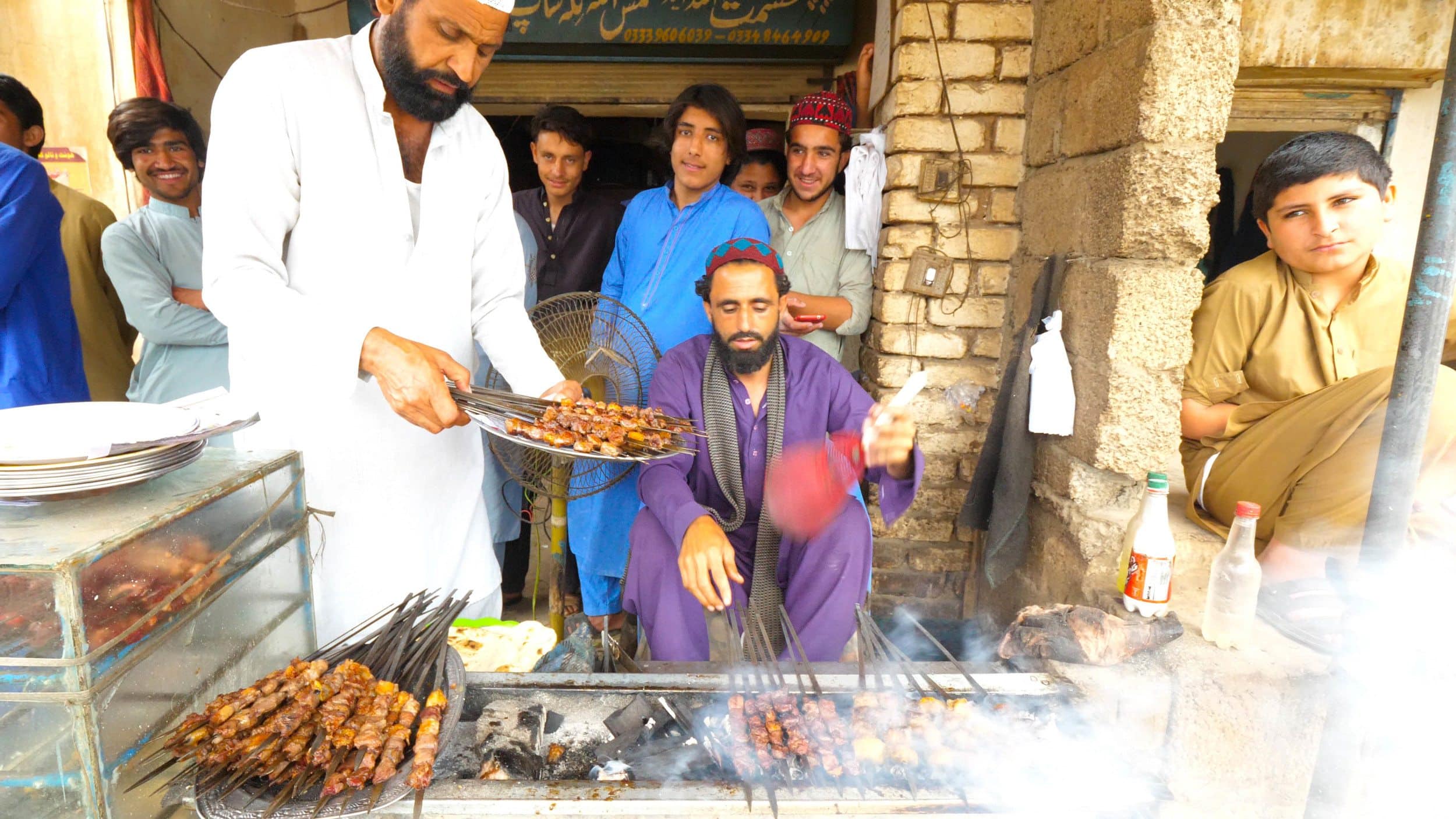 Street food vendor on our drive up to miranshah selling beef kababs